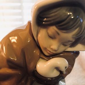 Lladro-Woman with goose peeking out from her cape!